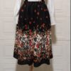 Jupe pour femmes avec bretelles à motif floral noir