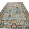 Tapis persan en laine noué à la main à Ispahan bordure florale bleu clair