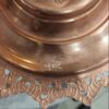 Plat décoratif en cuivre inspiré par l'art persan