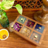 Boîte organisatrice en bois pour sachets de thé inspirée par le design persan