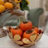 Bol décoratif en métal avec design floral modèle Borna