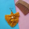 Boucles d'oreilles à pompons en macramé avec motif de feuille pour femmes