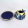 Bougeoir en poterie persane fait main avec design d’oiseau