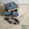 Boîte à bijoux en os artisanale avec design d'inspiration persane