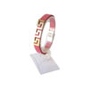Bracelet en cuir avec motif géométrique rose