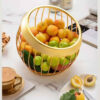 Panier à fruits en fil métallique stylé en or, fonctionnel et chic