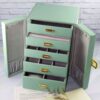 Boîte à bijoux avec rangement à plusieurs niveaux et serrure pour une organisation optimale