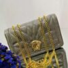Sac à main en simili cuir luxueux avec chaîne imposante