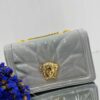 Sac à main en simili cuir luxueux avec chaîne imposante