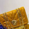 Sac à main en simili cuir luxueux avec chaîne imposante