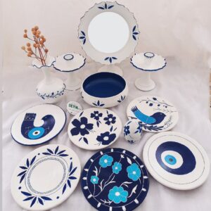 Beauté symbolique – Haft-Seen peint à la main avec motifs floraux, oiseaux et œil protecteur (12 pièces)