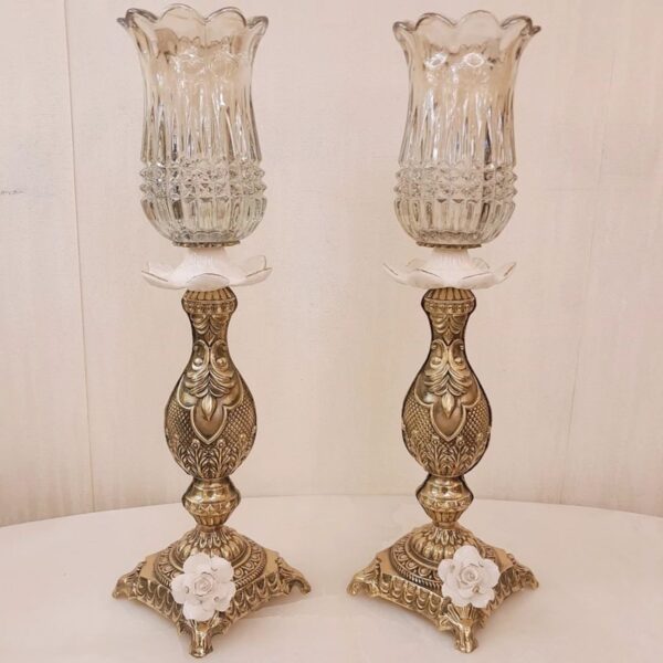 Bougeoir en bronze avec design fleur blanche