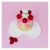 Bougie fantaisie jaune citron en forme de gâteau à étages avec ourson et framboise